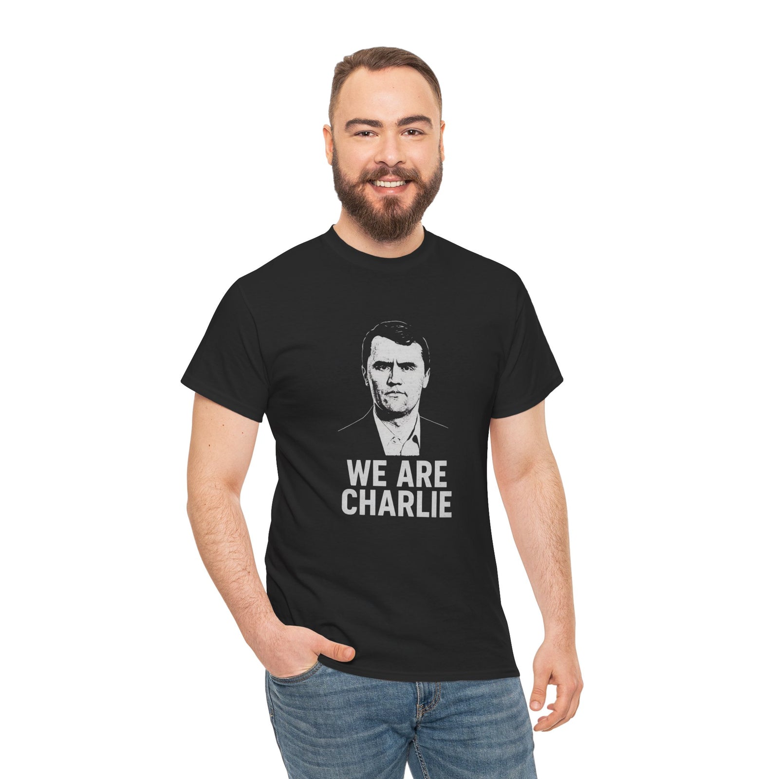 Man wearing a black t-shirt with 'WE ARE CHARLIE' text and graphic on a white background