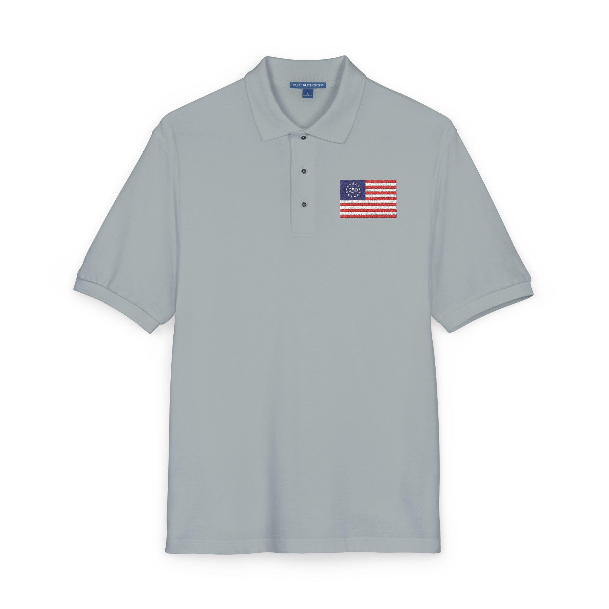 Gray polo shirt with a small American flag patch on a white background