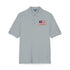 Gray polo shirt with a small American flag patch on a white background