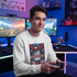 Guy gamer with face visible wearing Less Government More Video Games sweatshirt